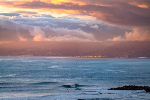 LA sea cost after storm with multi colored sky and clouds